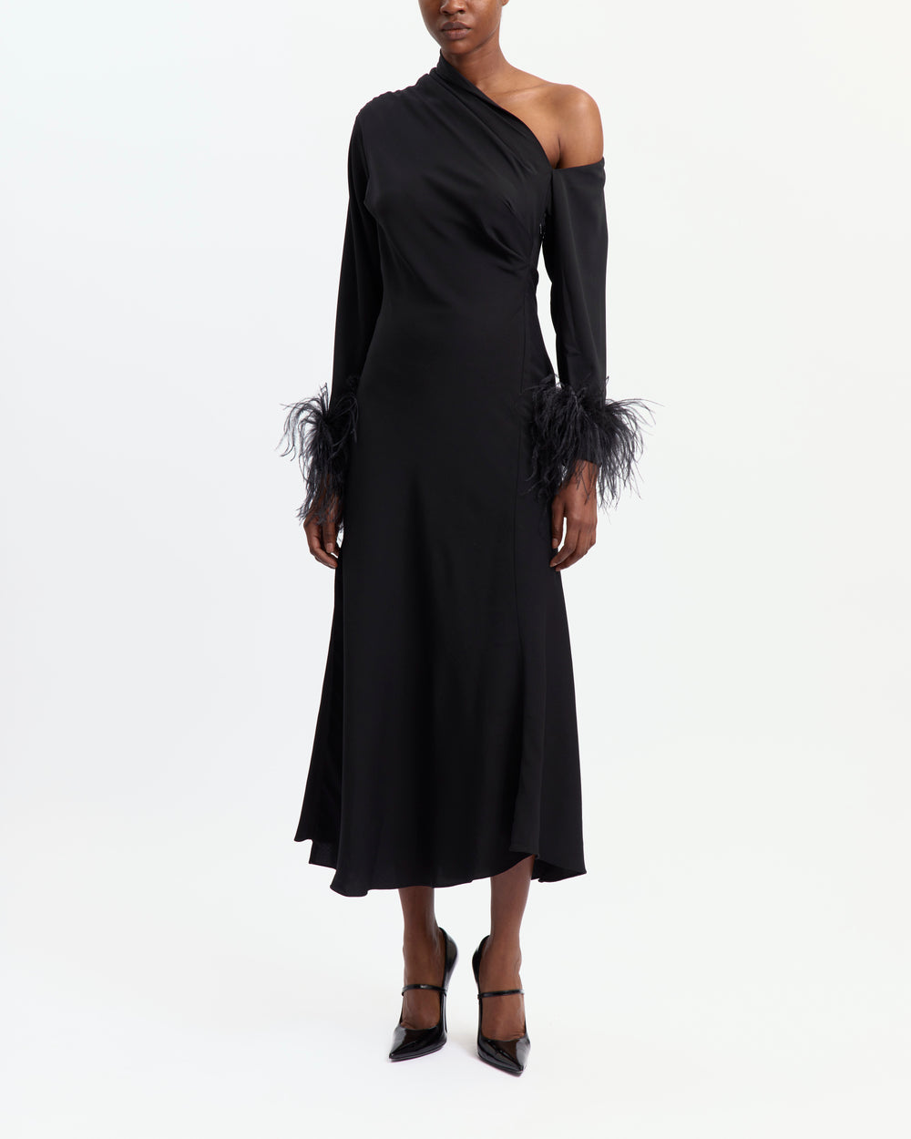 16Arlington Adelaide black crepe asymmetric off-the-shoulder dress with gathered detailing, ostrich feather-trimmed cuffs and a side split, ideal for cocktail and evening occasions from a luxury British designer brand.