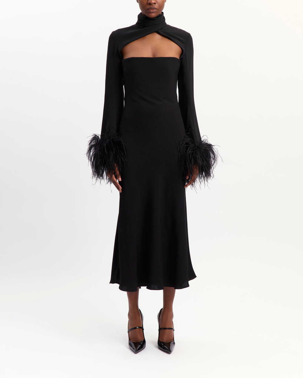 16Arlington Odessa black crepe dress with a high neckline, chest cut-out, long feather-trimmed sleeves and an A-line skirt, ideal for cocktail and evening occasions from a luxury British designer brand.