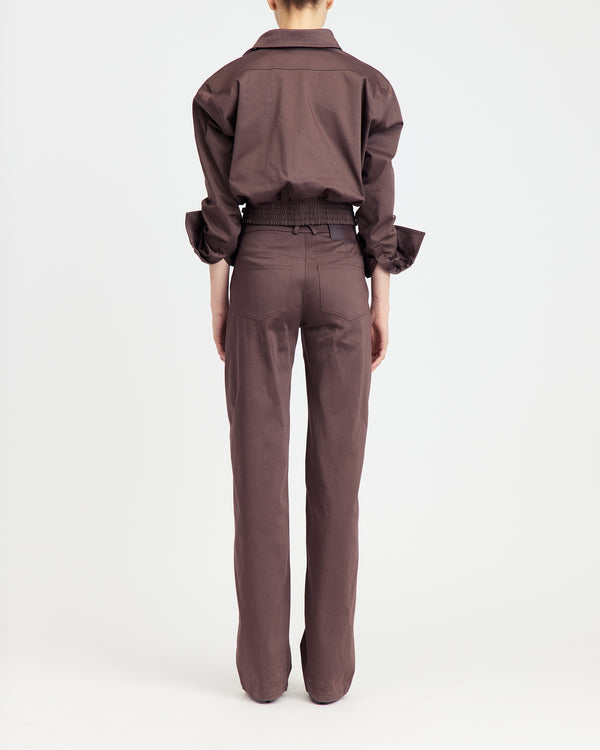 16Arlington Jolie jacket in nocciola cotton sateen, featuring a cropped silhouette with a cinched waist, plunging neckline and pointed collar with ruched sleeves and contrast leather buckle. This jacket brings signature tailoring to elevated daytime and evening looks from a luxury British designer brand. - back view