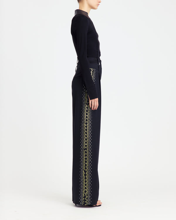 16Arlington Pia top with black smooth jersey, featuring a plunging V-neckline framed by a brown leather pointed collar with branded metal-tipped cord lacing. This refined piece brings modern tailoring to everyday and party looks from a luxury British designer brand. - side view