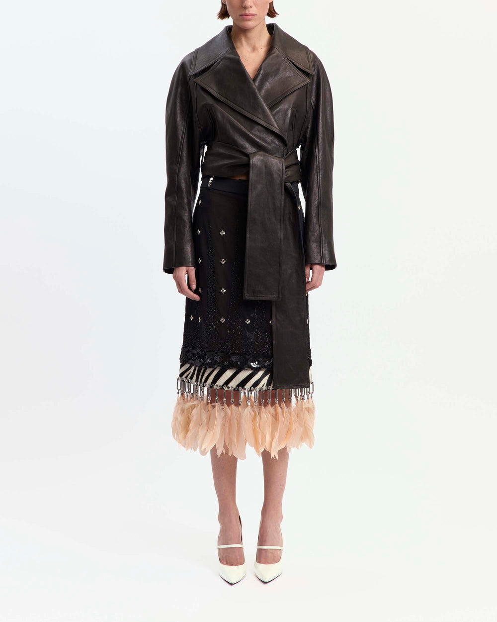 16Arlington Amalia skirt in embellished tulle, designed in a slightly sheer straight silhouette, featuring intricate hand-embroidered sequins and delicate beadwork, with a tailored waistband detailed by individually applied rivet studs, finished with a zebra-print pony hair hem, branded silver carabiners, eyelets and blush pink feather trim, ideal for occasion wear and statement dressing from a luxury British designer brand.