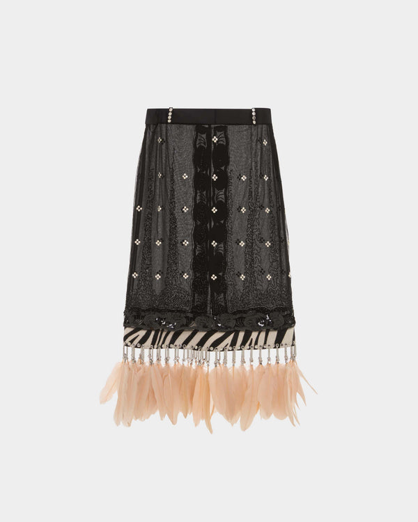 16Arlington Amalia skirt in embellished tulle, designed in a slightly sheer straight silhouette, featuring intricate hand-embroidered sequins and delicate beadwork, with a tailored waistband detailed by individually applied rivet studs, finished with a zebra-print pony hair hem, branded silver carabiners, eyelets and blush pink feather trim, ideal for occasion wear and statement dressing from a luxury British designer brand.