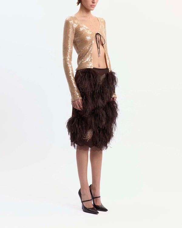 16Arlington Arno midi skirt in chocolate satin, designed in a pencil silhouette, featuring feather-pattern crystal hot-fix applications and plumes of feather trim, finished with hand-applied scalloped lace at the hem, ideal for occasion wear and statement dressing from a luxury British designer brand. - side view