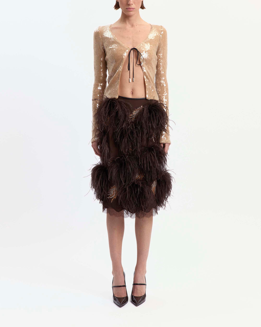 16Arlington Arno midi skirt in chocolate satin, designed in a pencil silhouette, featuring feather-pattern crystal hot-fix applications and plumes of feather trim, finished with hand-applied scalloped lace at the hem, ideal for occasion wear and statement dressing from a luxury British designer brand.