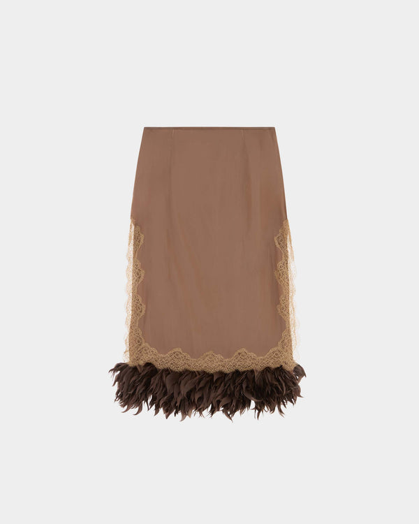 16Arlington Velino skirt in toffee satin, designed in a straight silhouette falling just below the knee, featuring side-split detailing with hand-applied scalloped lace and a feather-trimmed hem, finished with a double-layered construction for wearability, ideal for evening styling and occasion wear from a luxury British designer brand.