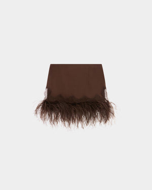 16Arlington Zelmi mini skirt in chocolate satin, designed in a low-waist silhouette cut to fall high above the knee, featuring hand-applied scalloped lace trim and a feathered hem, ideal for party wear and statement occasions from a luxury British designer brand.