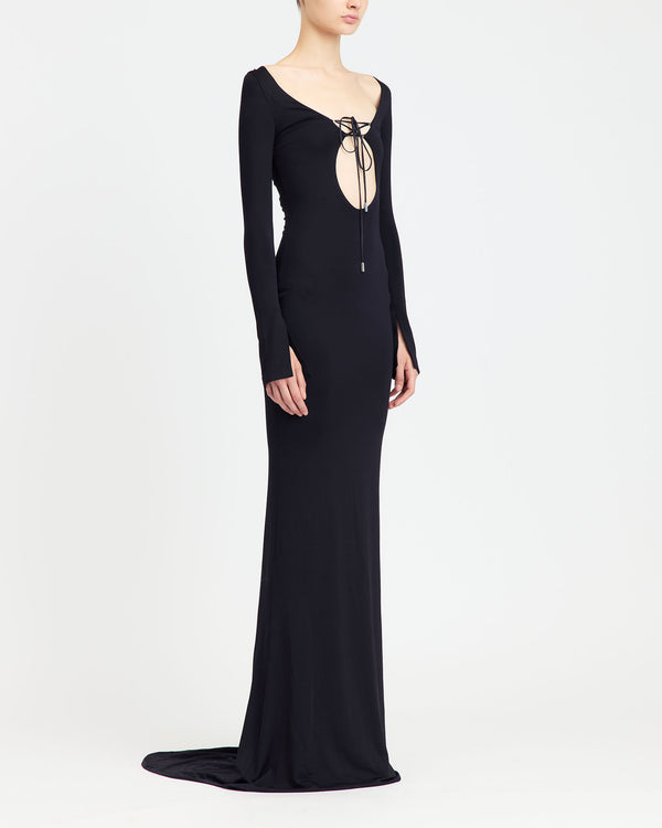 16Arlington Solaris gown in black slinky jersey with long sleeves, front cut-out and plunging V-back with matching lace-up detailing, . An evening gown inspired by red carpet and after-dark occasions from a luxury British designer brand. - side view