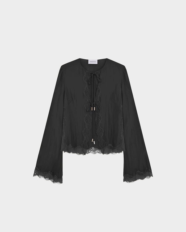 16Arlington Filipa cardigan in black satin, designed in a sleek silhouette with a relaxed fit, featuring flared sleeves and scalloped lace trim with branded metal-tipped ties for added detail, ideal for evening styling, occasion wear and elevated everyday dressing from a luxury British designer brand.